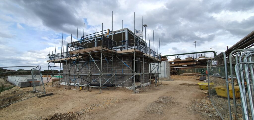 scaffolding around a building being constructed at a sugar factory in Newark