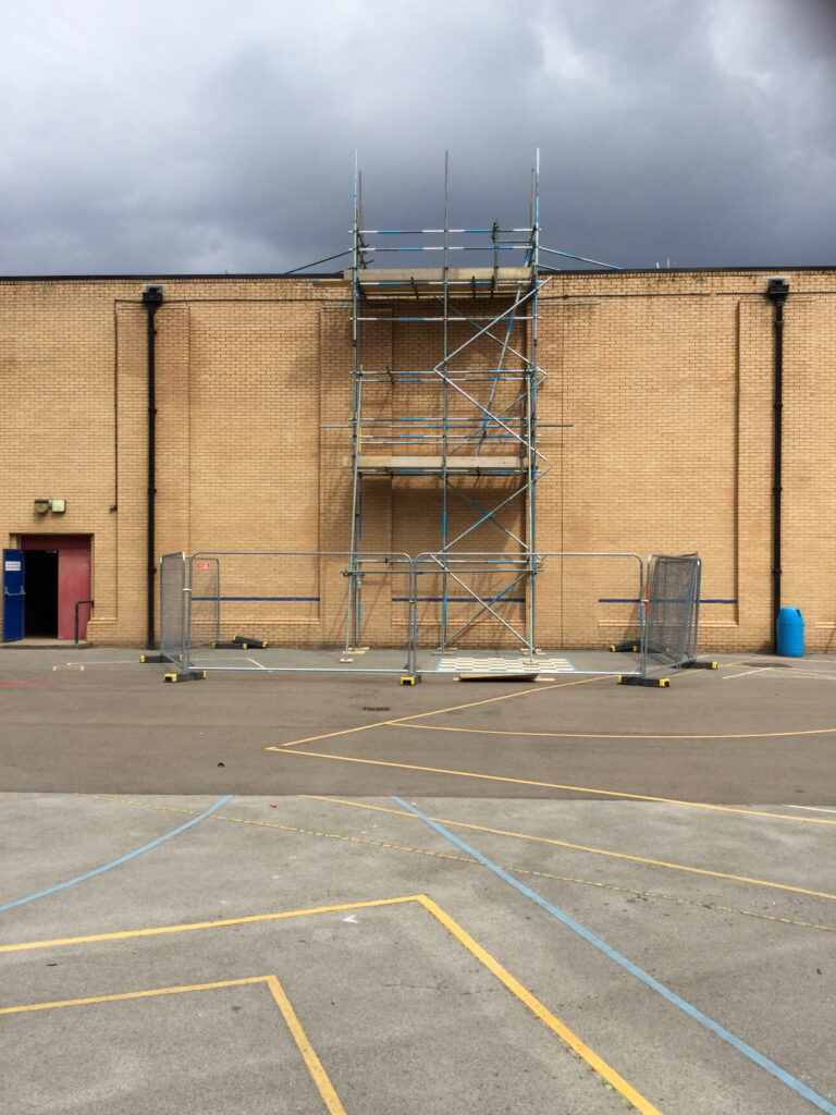 scaffold tower for safe roof access to a large building