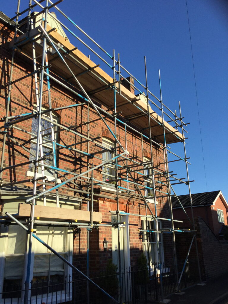 scaffolding on the front of a house in Birchwood - image 2