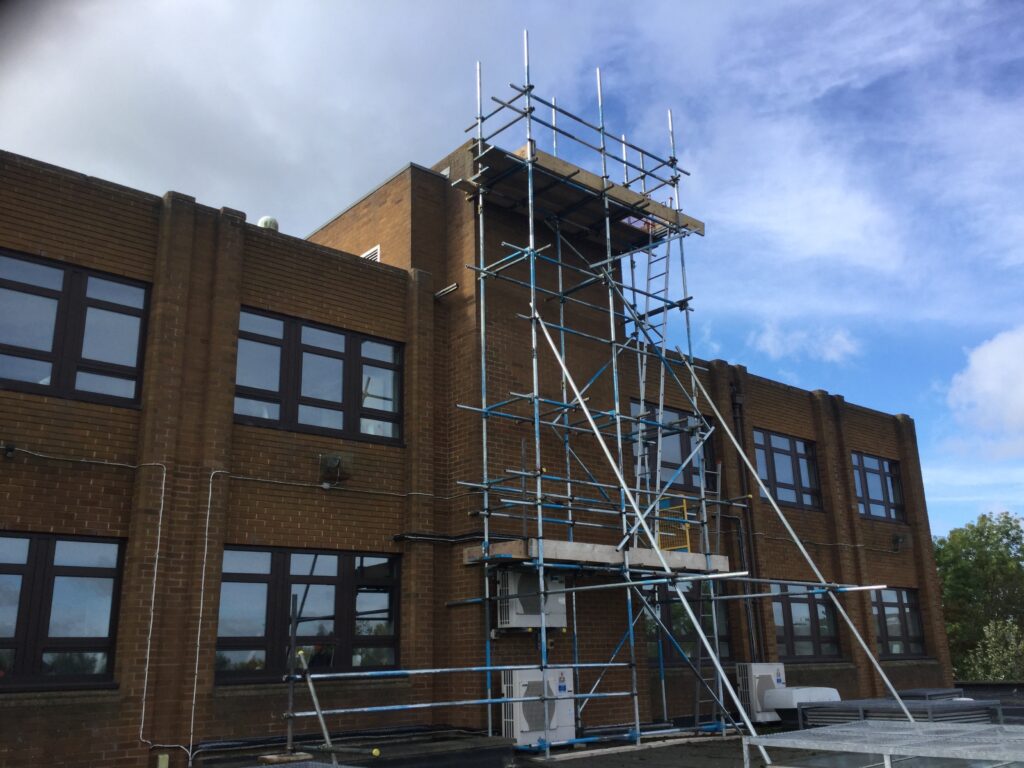 scaffolding equipment on the back of the government office in Lincoln - image 3