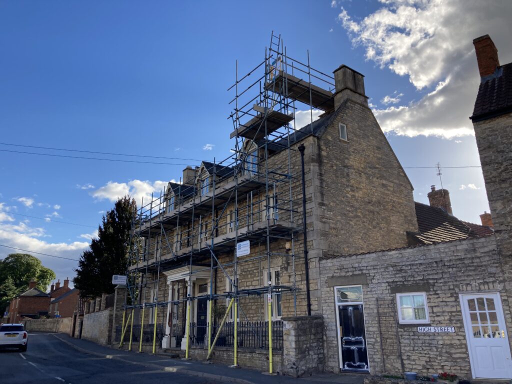 Scaffolding on the front of a house in Heighington for decoration works & flue installation - image 5