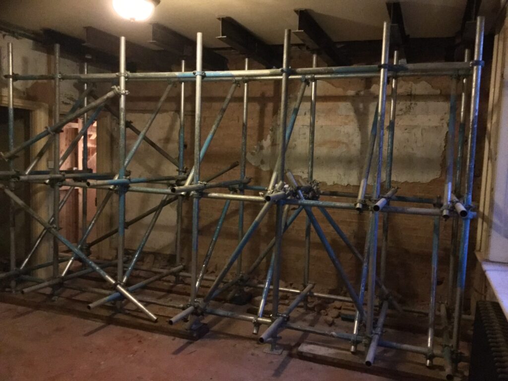scaffolding inside of a building for renovation