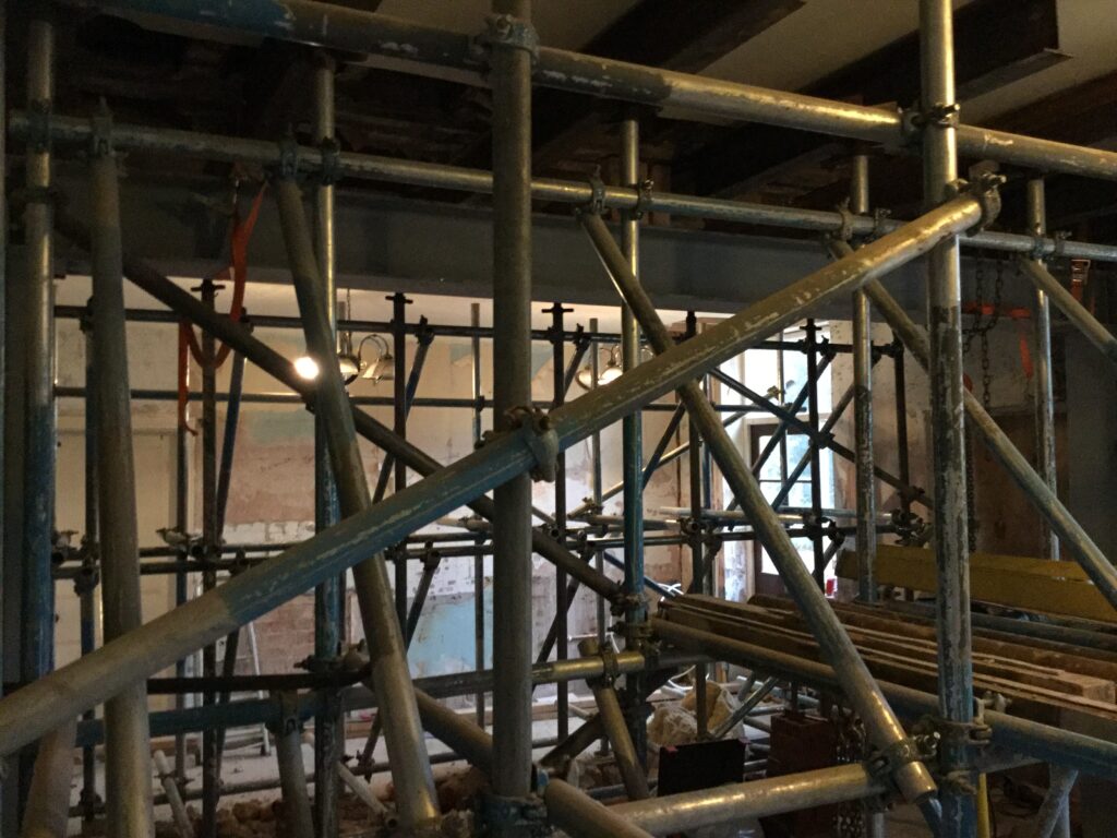 scaffolding inside of a building for renovation - image 3