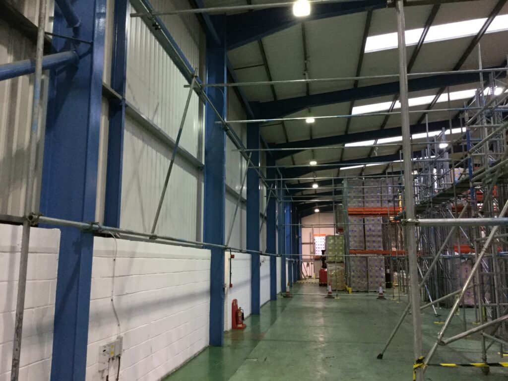 scaffolding inside of a warehouse - image 2