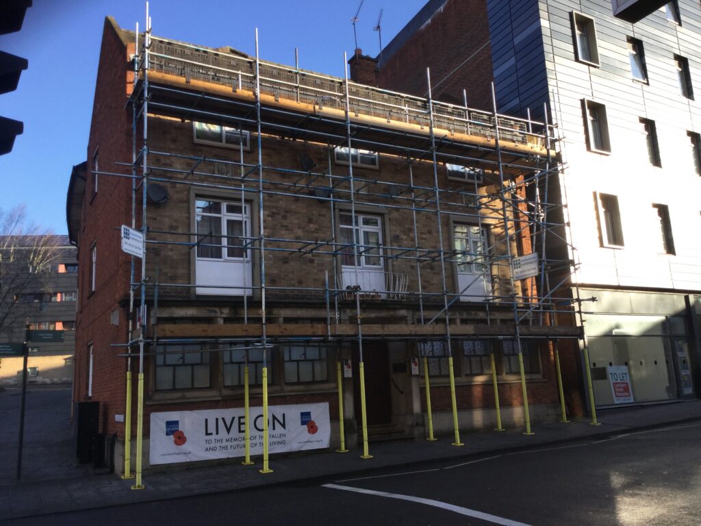 commercial scaffolding on a building by a road in Lincoln - image 2