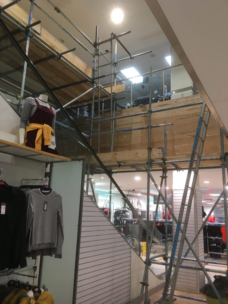 scaffolding over escalator in shop located in Lincoln - image 6