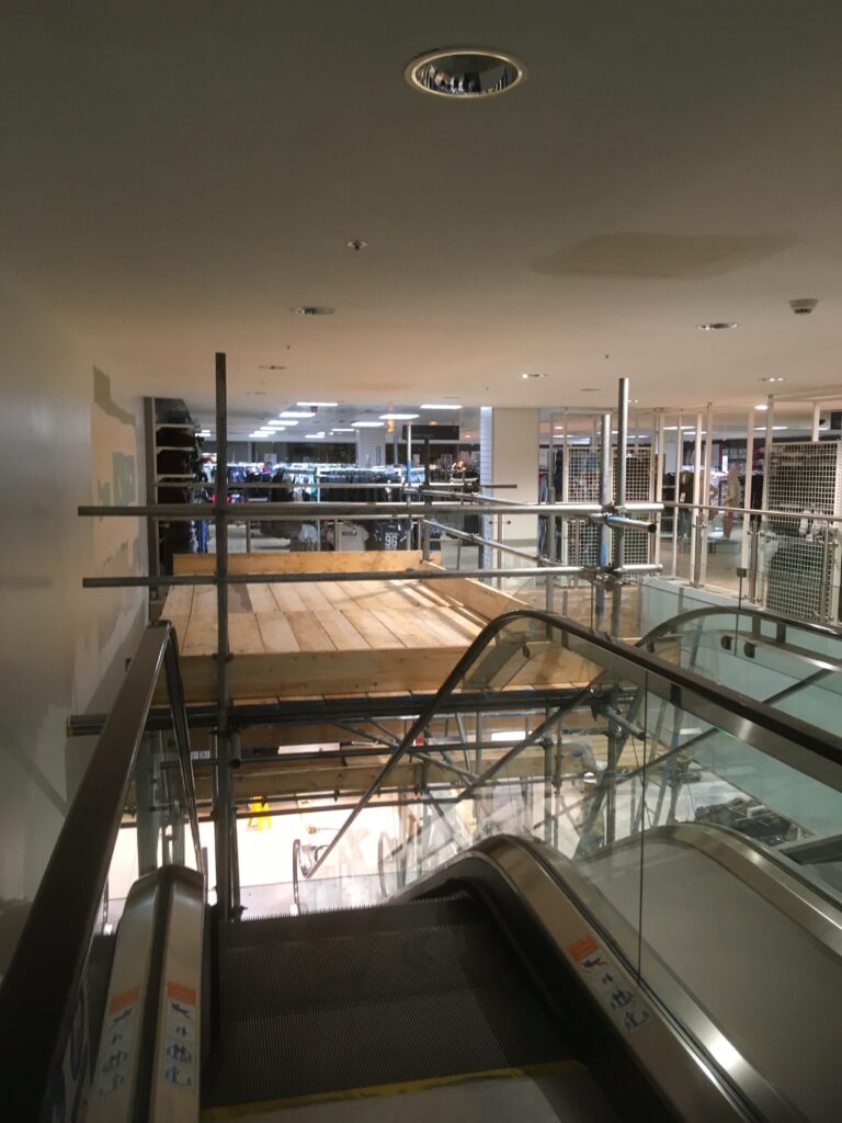 scaffolding over escalator in shop located in Lincoln - image 3