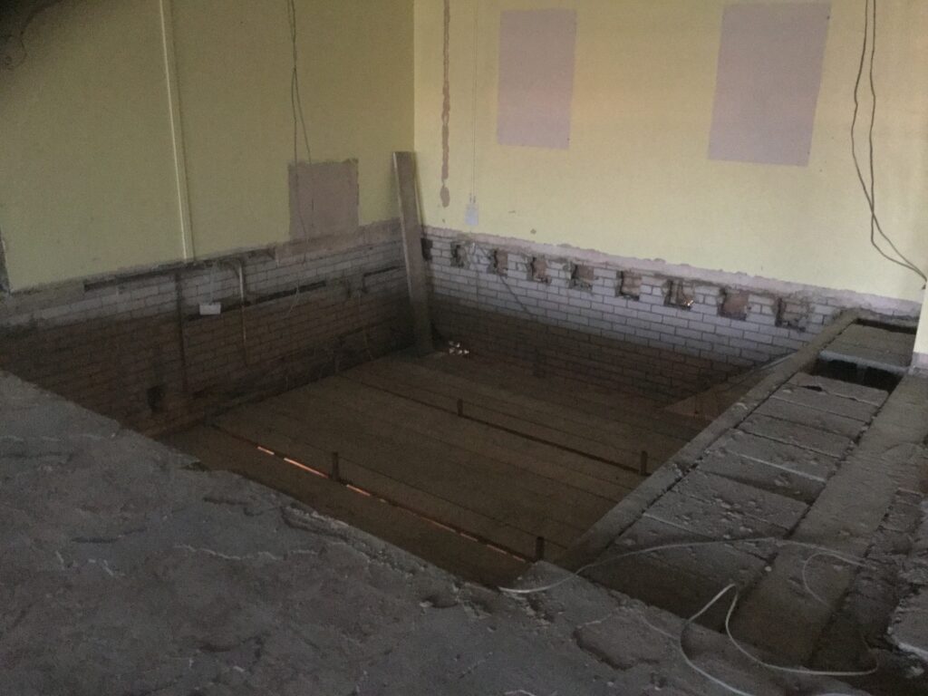 a hole in the floor of a building