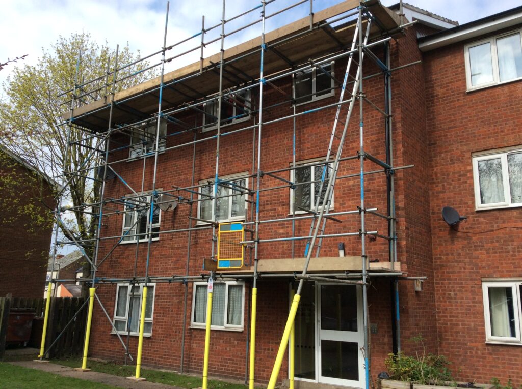 scaffolding on front of block of flats in Lincoln - image 3