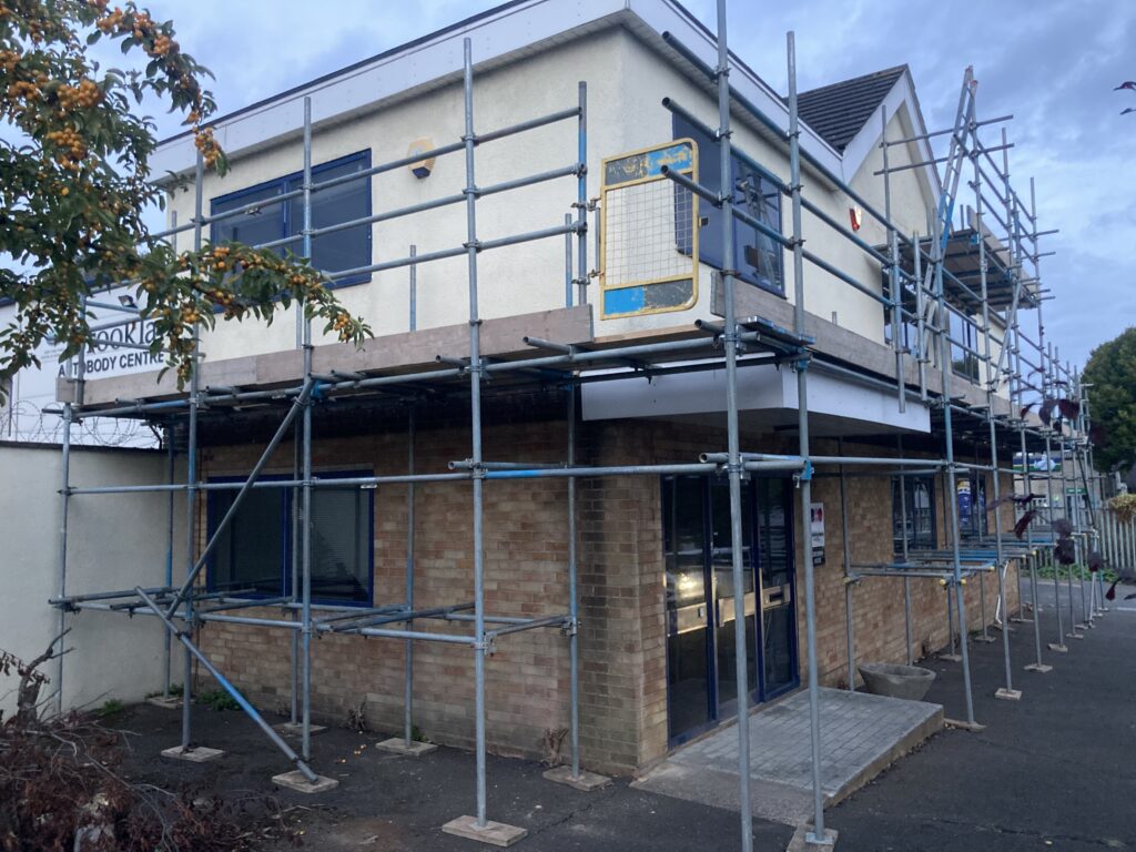 scaffolding surrounding centurion house for repair works - image 3