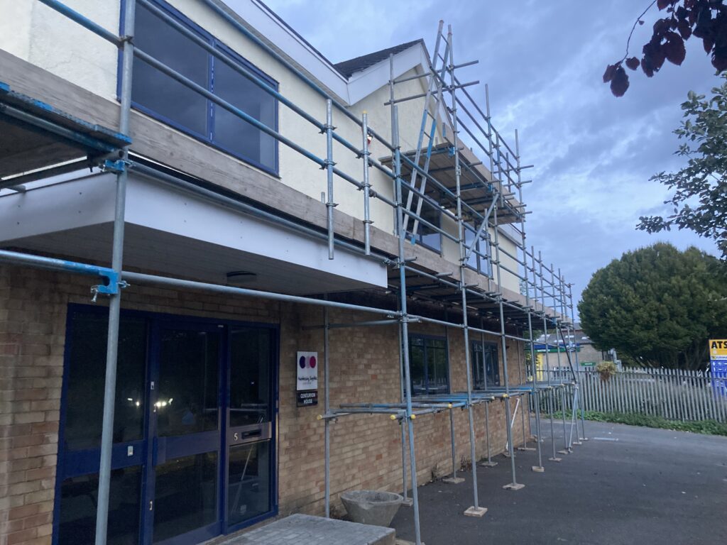 scaffolding surrounding centurion house for repair works - image 2