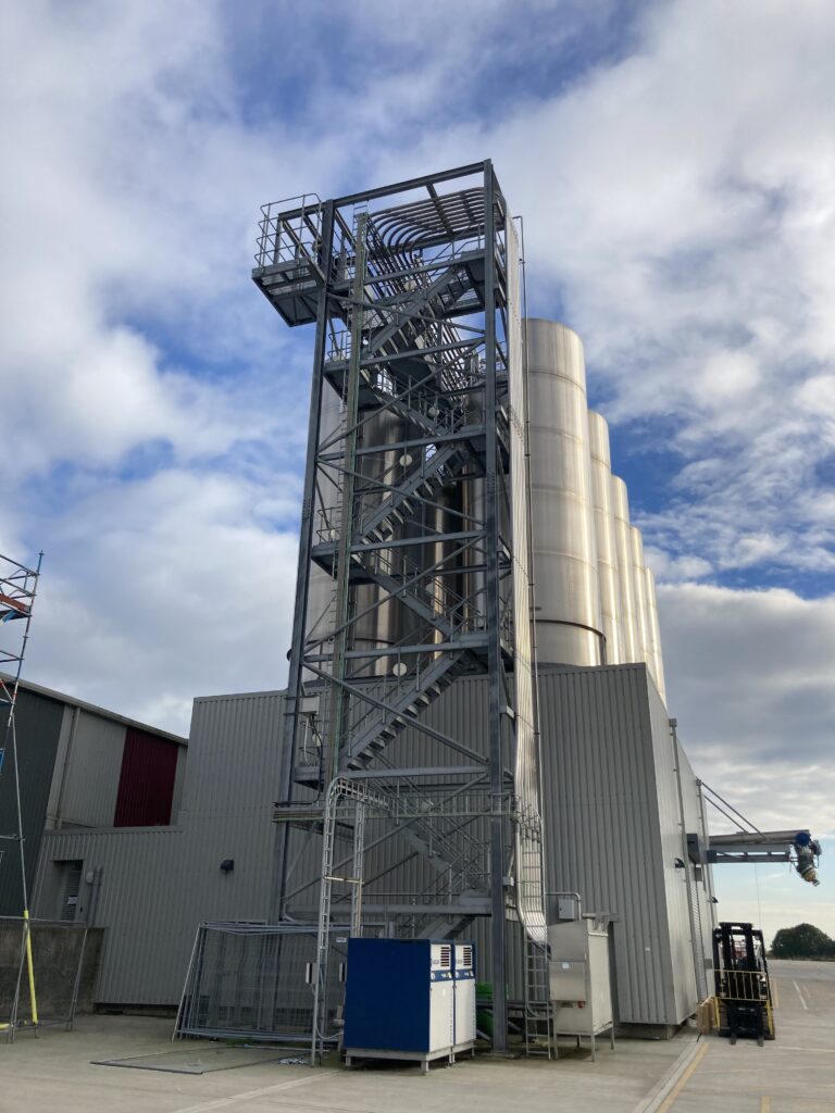 scaffolding on commercial building for pipework installation