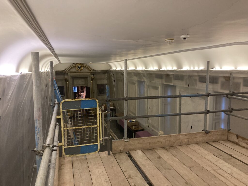 scaffolding with railing in a hallway