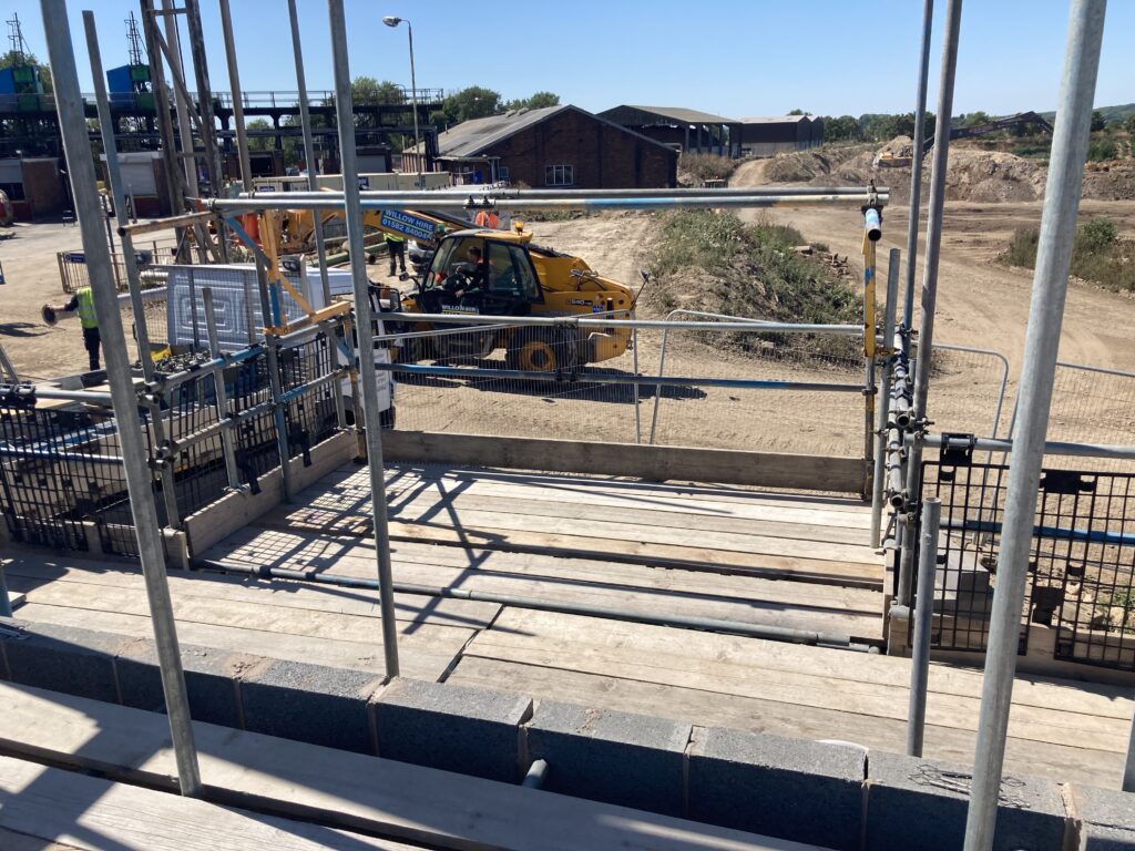scaffolding and construction equipment at a sugar factory in Newark