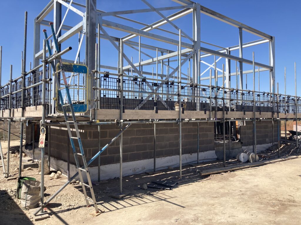 scaffolding for construction of a new room at a sugar factory in Newark