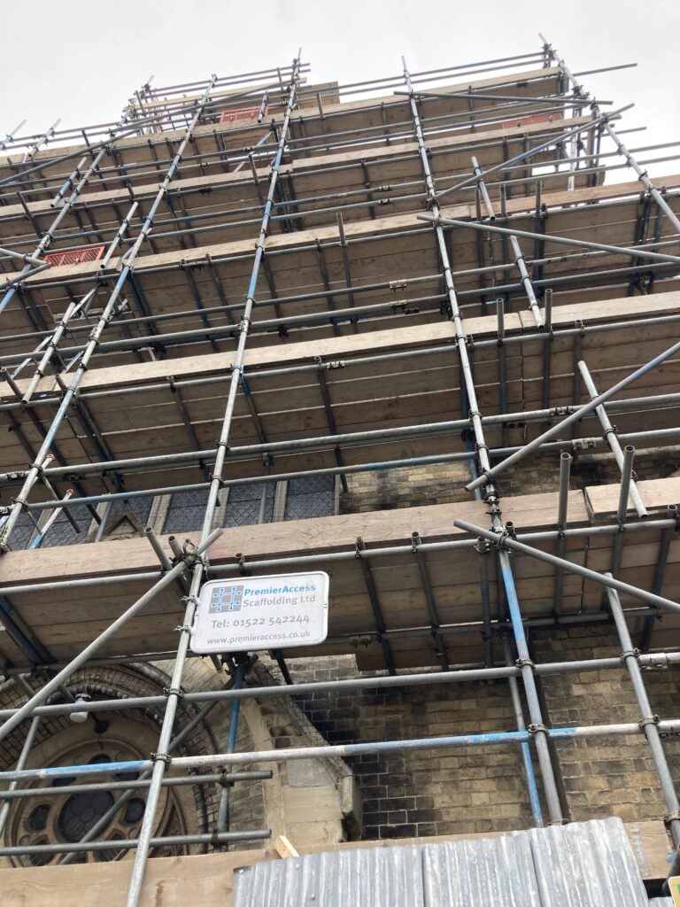 ground floor view of spilsby methodist chapel covered in scaffolding from the top to bottom at the front