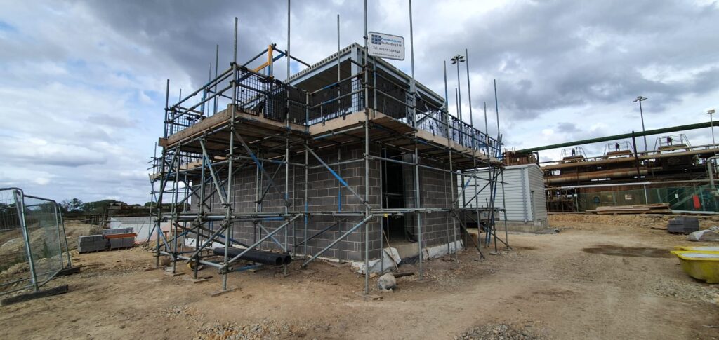 scaffolding around a building being constructed at a sugar factory in Newark - image 2