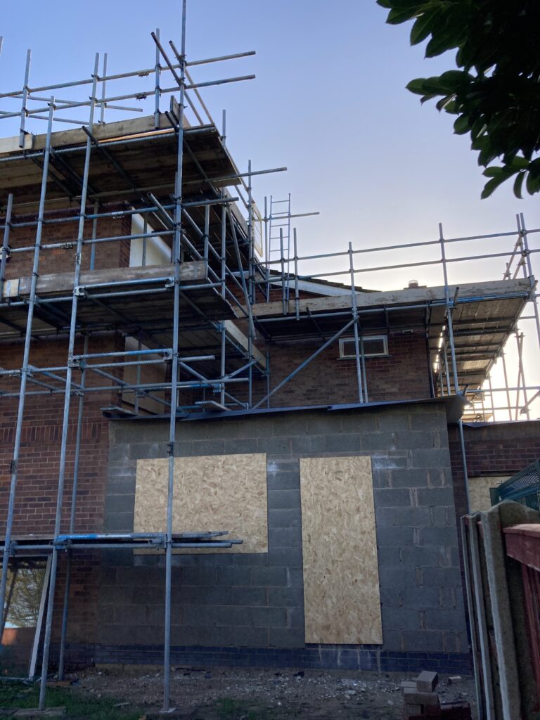 scaffolding surrounding an entire building in Lincoln
