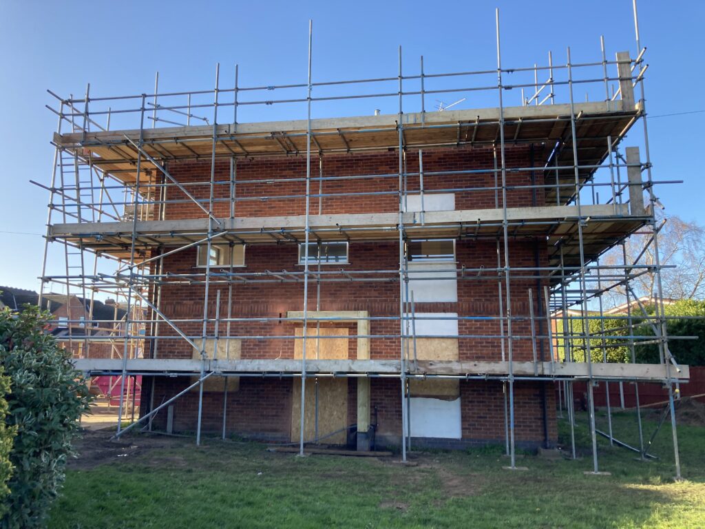 scaffolding surrounding an entire building in Lincoln