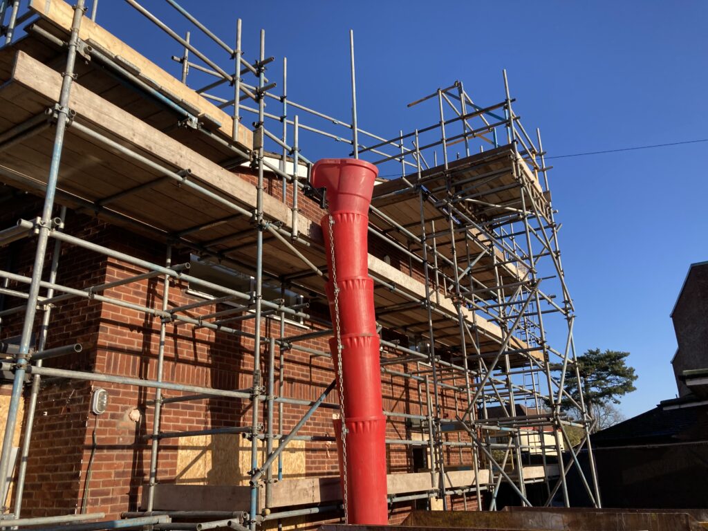 scaffolding surrounding an entire building in Lincoln