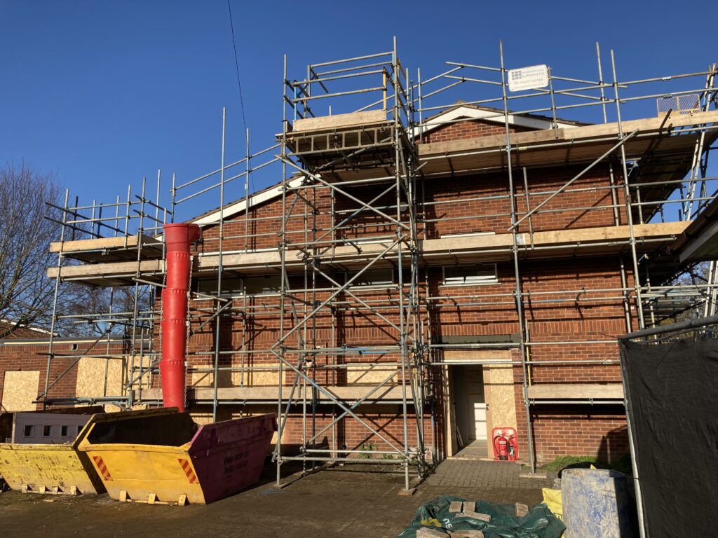 scaffolding surrounding an entire building in Lincoln