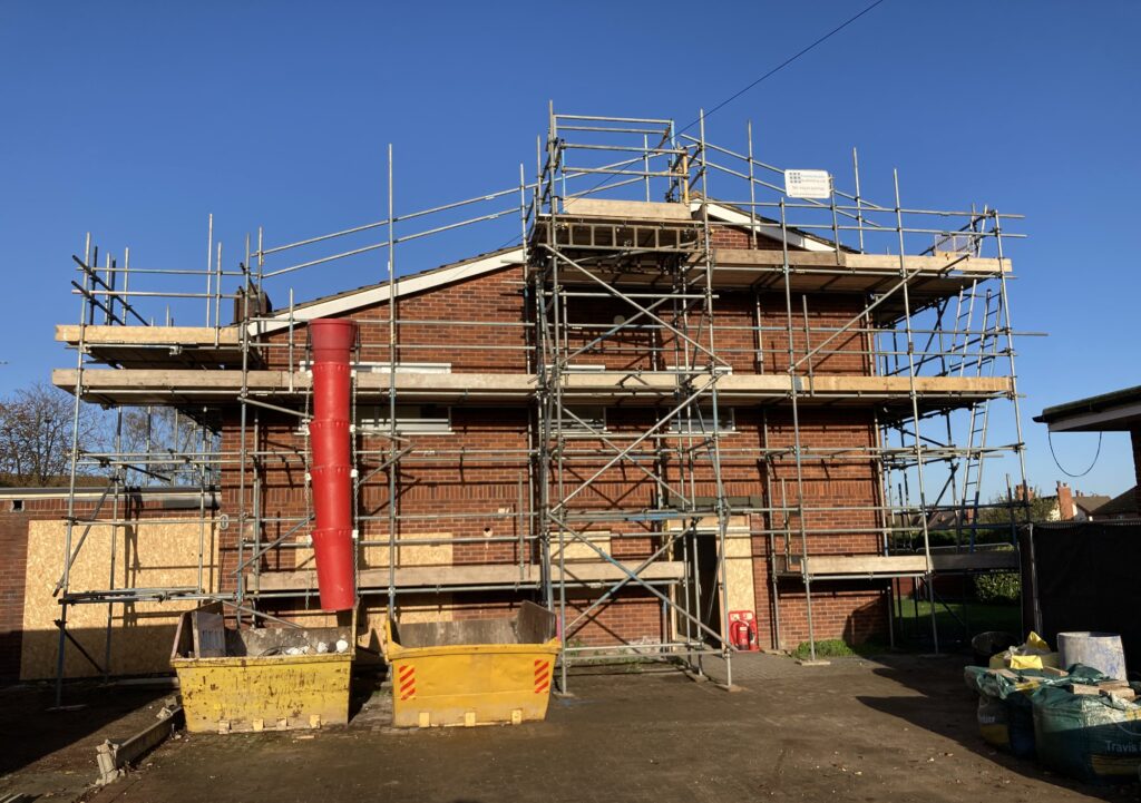scaffolding surrounding an entire building in Lincoln