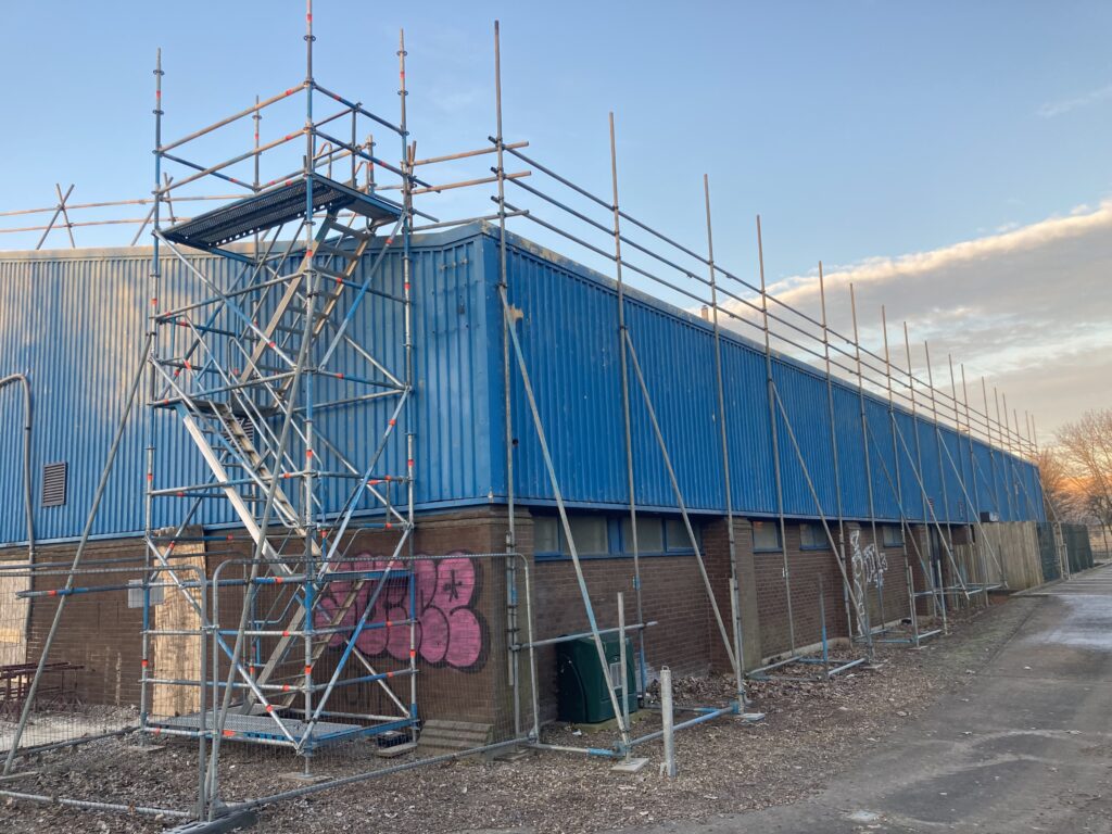 commercial scaffolding equipment on the back of a building in Lincoln