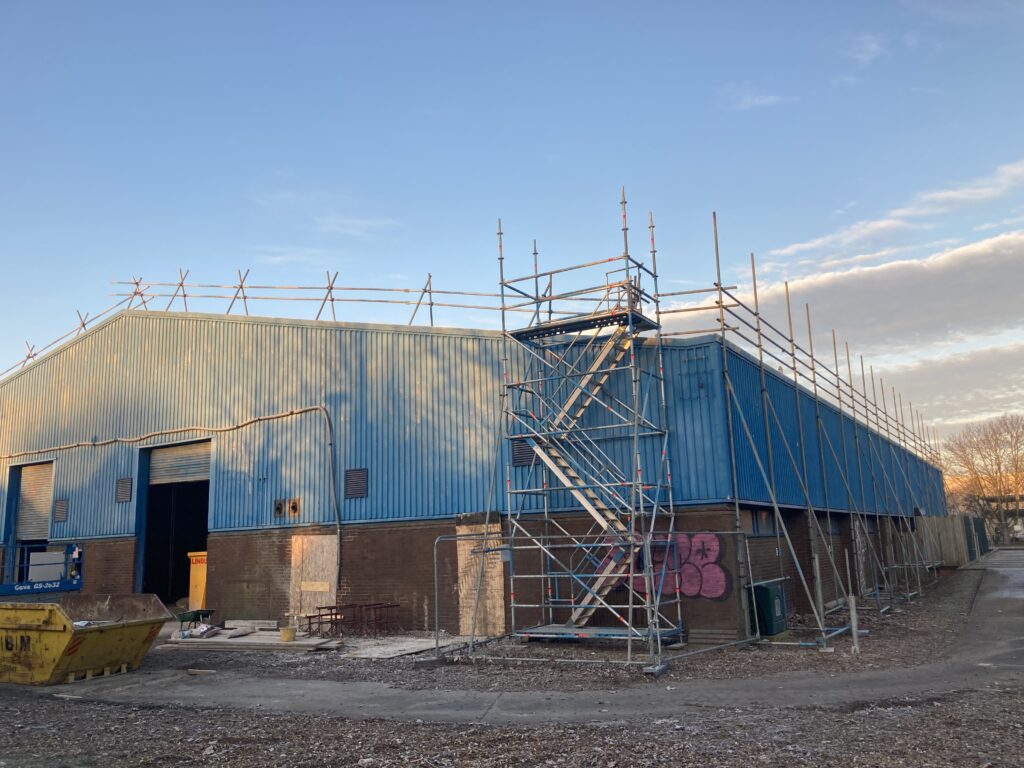 commercial scaffolding equipment on the back of a building in Lincoln