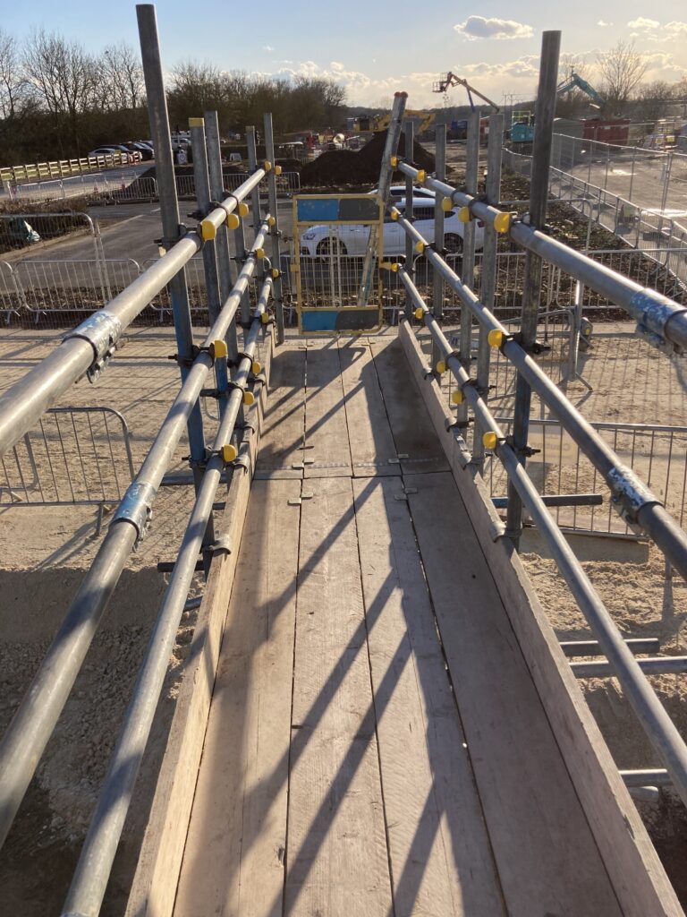 a small amount of scaffolding on a construction site