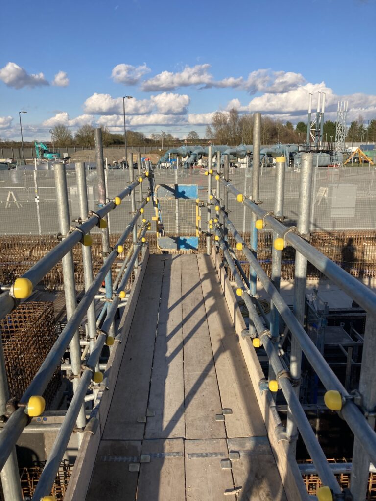 a small amount of scaffolding on a construction site
