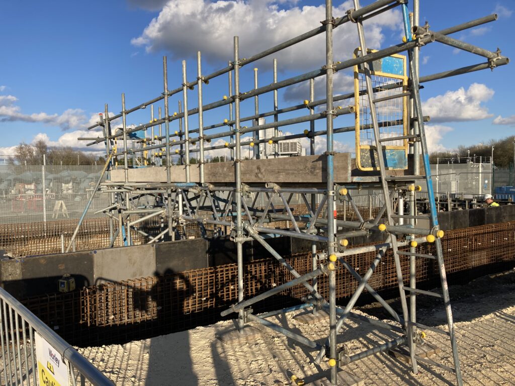 a small amount of scaffolding on a construction site