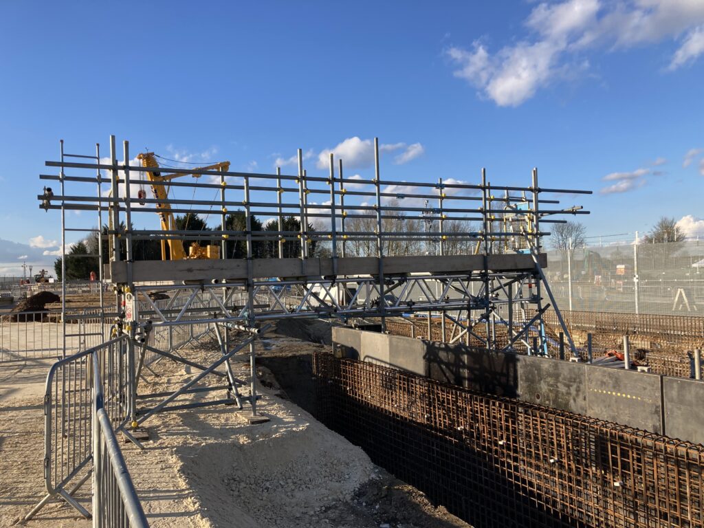 a small amount of scaffolding on a construction site