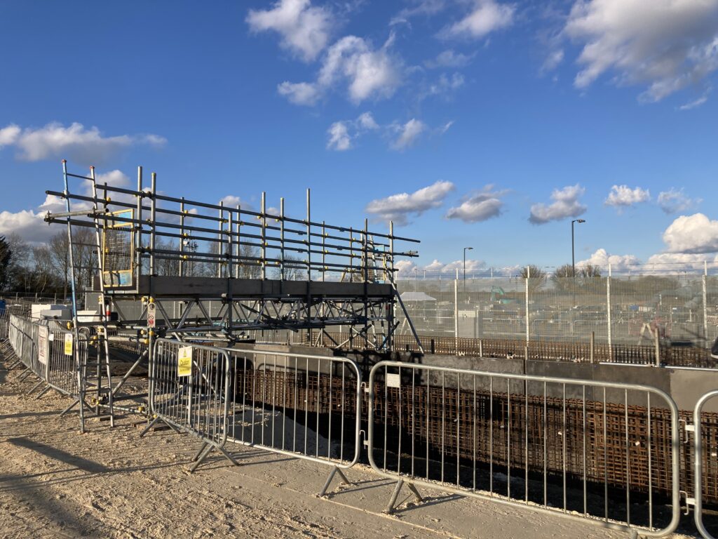a small amount of scaffolding on a construction site