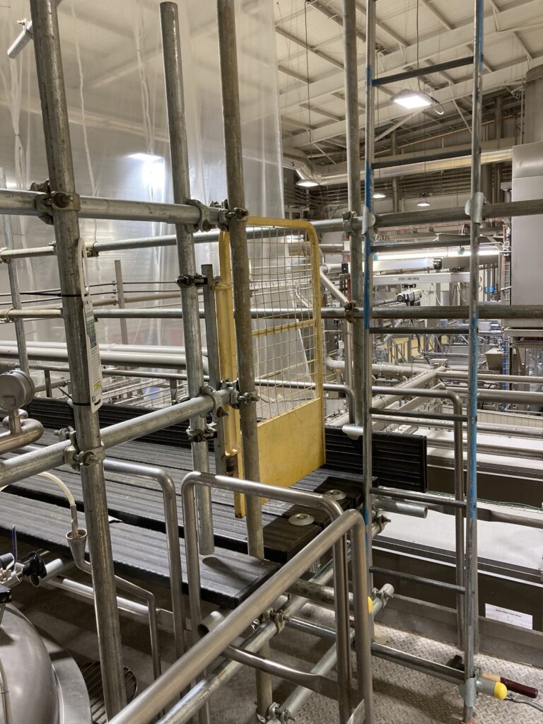 Scaffolding for safe access to mixing tanks in a food product factory in Lincolnshire