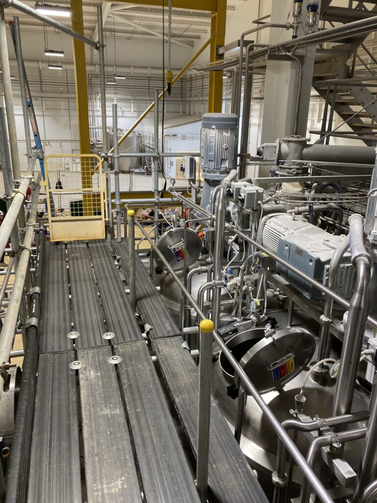 Scaffolding for safe access to mixing tanks in a food product factory in Lincolnshire