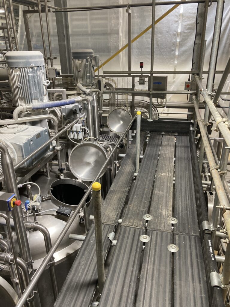 Scaffolding for safe access to mixing tanks in a food product factory in Lincolnshire