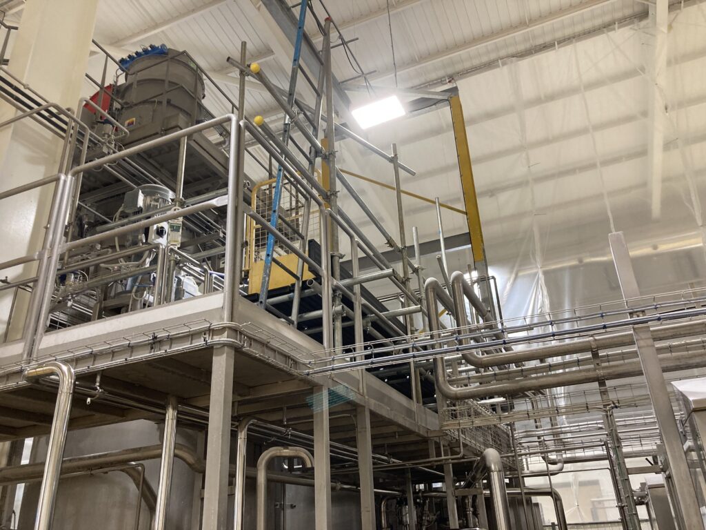 Scaffolding for safe access to mixing tanks in a food product factory in Lincolnshire
